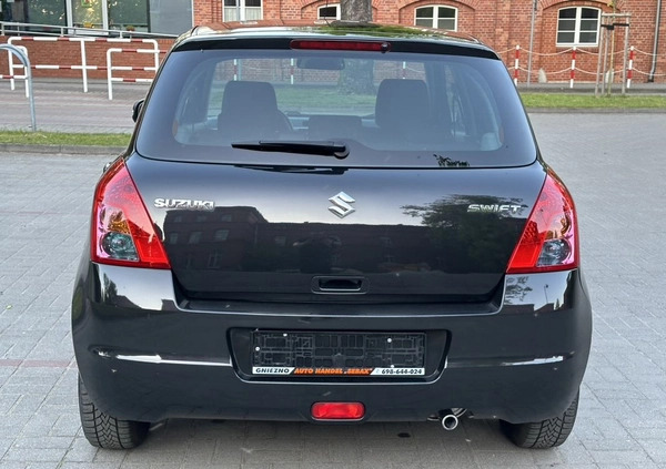 Suzuki Swift cena 16900 przebieg: 121000, rok produkcji 2009 z Gniezno małe 497